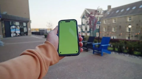 Mobile Phone Display With Green Screen Held During Day In City Stock Footage 314113982