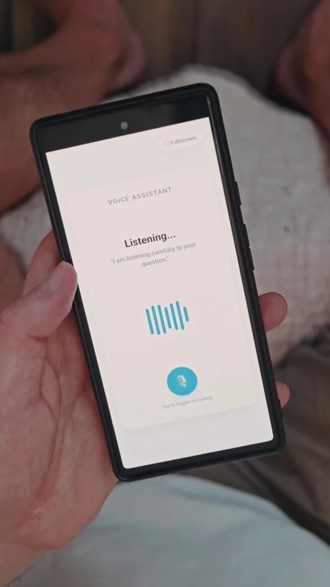 Mobile phone displaying voice assistant listening to user query with sound wave Stock Footage 341861394