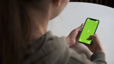Mobile phone with green screen close up.  Chroma key on   the cell phone. Video stock 123948050