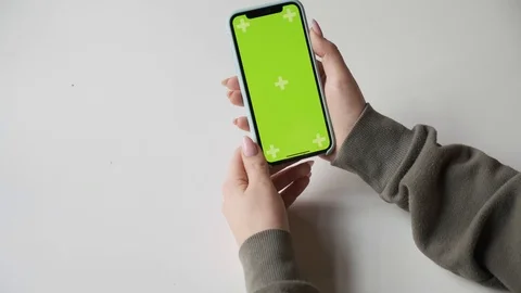 Mobile phone with green screen close up.  Chroma key on   the cell phone. Stock Footage 125123239