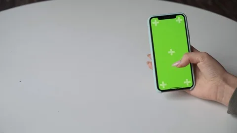 Mobile phone with green screen close up.  Chroma key on   the cell phone. Stock Footage 125123260