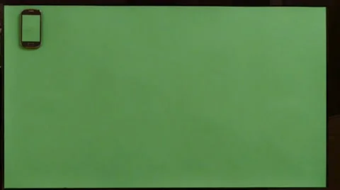 Mobile Phone On a Green Screen Stock Footage 47973527