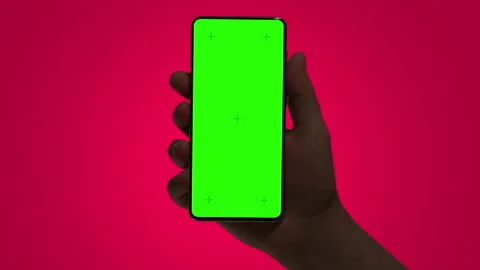 Mobile phone in hand with green screen Stock Footage 201806693