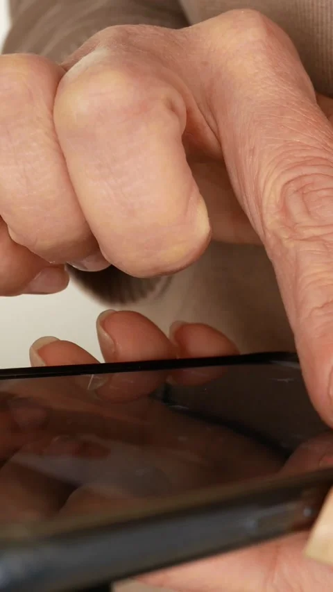 Mobile phone in hand. Working with a mobile application. Close-up Stock Footage 306209036
