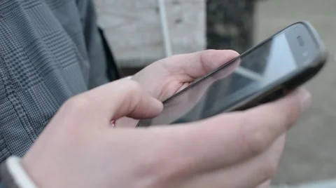 Mobile phone in the hands of man - Communication via chat and SMS Stock Footage 61193783