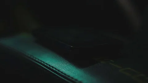 Mobile Phone Laying inside Car and Light with Incoming Call Stock Footage