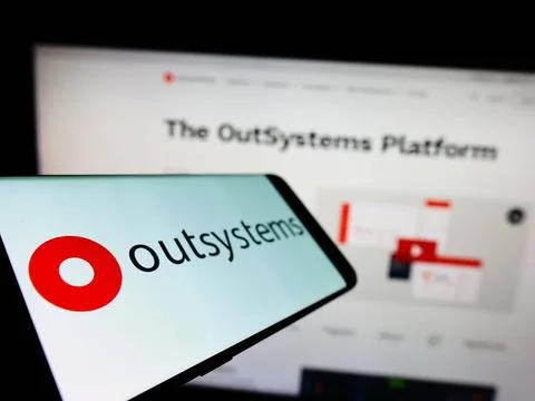 Mobile phone with logo of low-code software company OutSystems on screen. ... Stock Photos