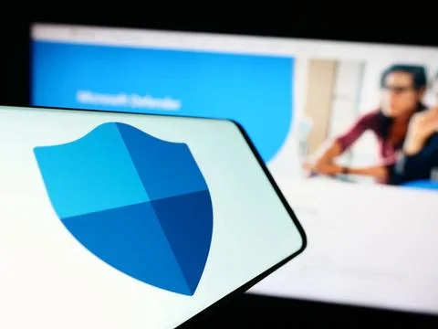  Mobile phone with logo of security software Microsoft Defender Antivirus ... Stock Photos
