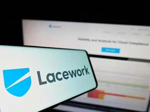 Mobile phone with logo of US cloud security company Lacework Inc. on screen in Stock Photos