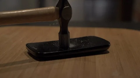 Mobile phone screen smashed with hammer in Slow Motion Vídeo Stock 97182788