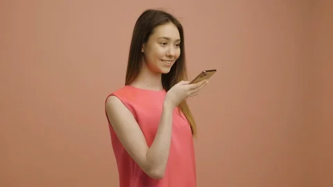 Mobile phone smart voice technology, student girl life. Beautiful young woman Stock Footage 127180469