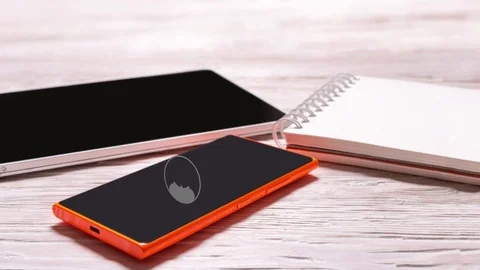 Mobile phone, tablet and notebook on office wooden desk, animated social network Stock Footage 85353218