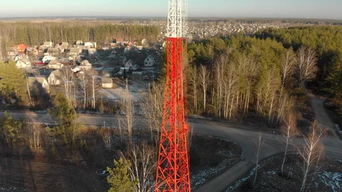 Mobile phone tower in the forest taiga near the electrified railway in Sunny 스톡 동영상 129723363