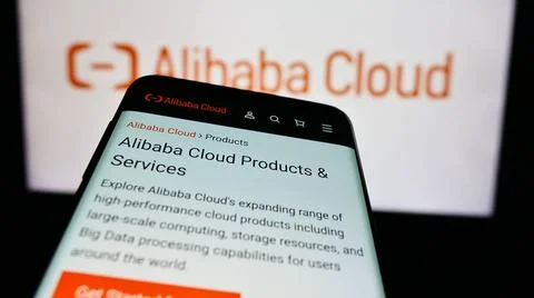  Mobile phone with website of Chinese computing company Alibaba Cloud in f... 스톡 사진