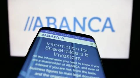  Mobile phone with website of company ABANCA Corporacion Bancaria S.A. on ... Stock Photos