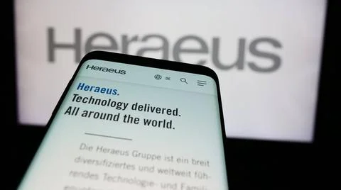  Mobile phone with website of German technology company Heraeus Holding Gm... 写真素材