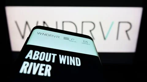 Mobile phone with website of US software company Wind River Systems Inc. on scre Foto stock