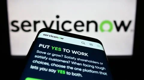 Mobile phone with website of US software company ServiceNow Inc. on screen... 写真素材