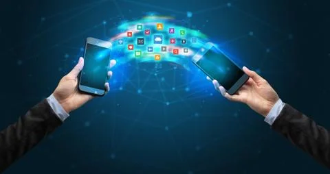 Mobile phones syncing application 写真素材