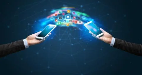 Mobile phones syncing application Stock Photos