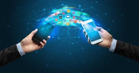 Mobile phones syncing application 스톡 사진