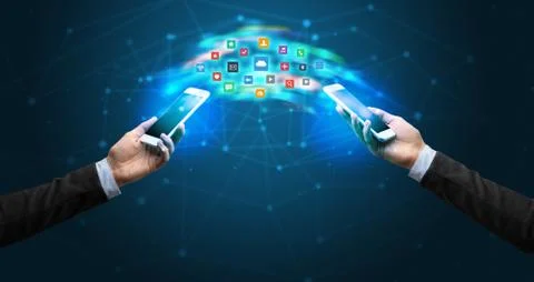 Mobile phones syncing application Stockfoto's