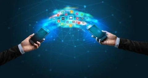 Mobile phones syncing application Stockfoto's
