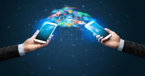 Mobile phones syncing application 写真素材