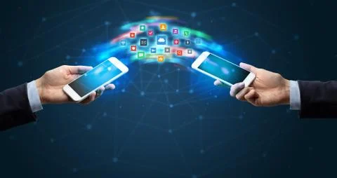 Mobile phones syncing application Stockfoto's