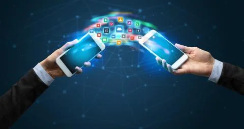 Mobile phones syncing application 写真素材