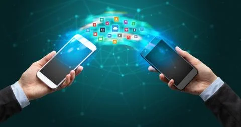 Mobile phones syncing application 스톡 사진