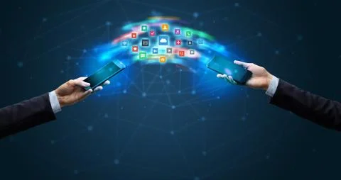 Mobile phones syncing application 스톡 사진