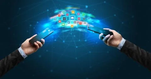 Mobile phones syncing application 库存照片