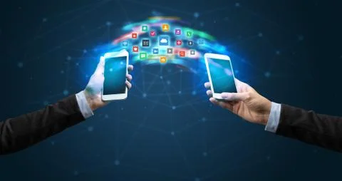 Mobile phones syncing application 写真素材