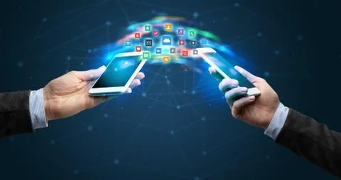 Mobile phones syncing application Stockfoto's