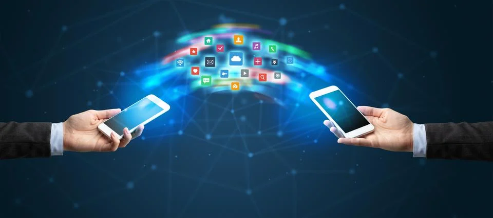 Mobile phones syncing application 스톡 사진