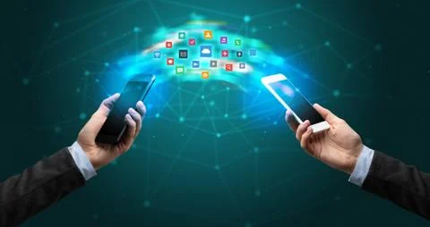 Mobile phones syncing application 写真素材