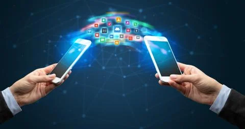 Mobile phones syncing application Stock Photos