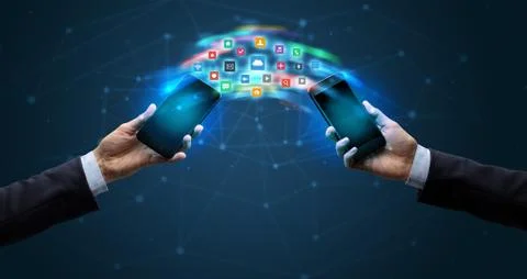 Mobile phones syncing application 写真素材