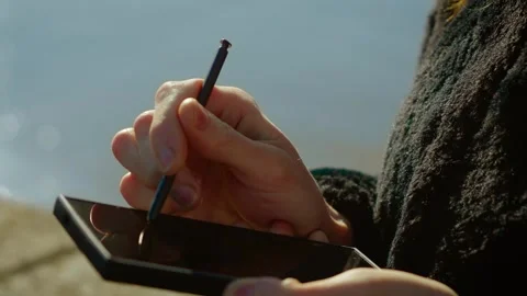 Mobile productivity increasing through note taking and digital sketching on Stock Footage 331207469