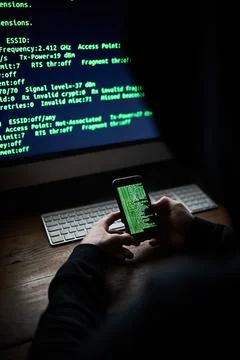 Mobile, programmer hands and code screen with software for hacking crime or Stock Photos