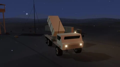 Mobile rocket artillery launcher raising its launch pod at twilight with Stock Footage 341044538