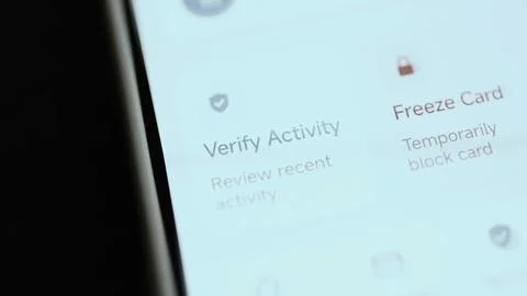 Mobile security controls place verify activity beside freeze card 库存照片