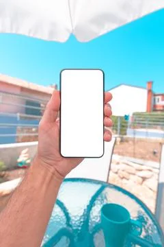 Mobile smart phone mockup screen, man enjoying summer vacation at apartment t 스톡 사진