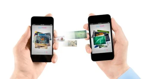 Mobile smart phones while transferring pictures Stock Photos