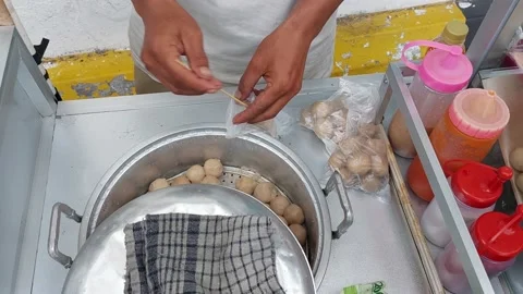 Mobile snack vendor serving customers Stock Footage 233645081