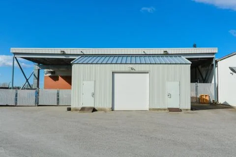 Mobile storage shed installed on the ground for temporary use. Photos