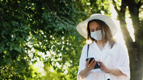 Mobile technology quarantine measures woman Stock Footage 140909443