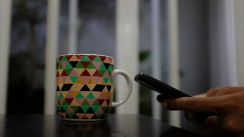 Mobile Texting and Drinking Coffee at Night Stock Footage 201871547