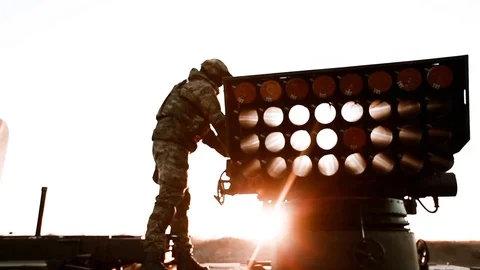 Mobility Artillery Rocket System. against the backdrop of the rising sun Stock Footage 121795730